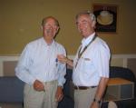 President Chris Wheatley presenting IPP jewel to C